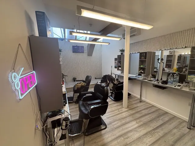 Inside: barber chairs and mirrors in Room 503